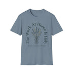 The Work At Home homeschool mom graphic t-shirt with a gathered-at-home inspired graphic with books, florals, and cozy family learning details