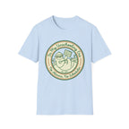 In My Unschooling Era homeschool mom graphic t-shirt with an adventurous homeschool graphic with nature, books, and outdoor learning energy
