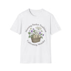 Morning Basket Tradition homeschool mom graphic t-shirt with a cozy morning basket-inspired design with books, gentle details, and home learning charm