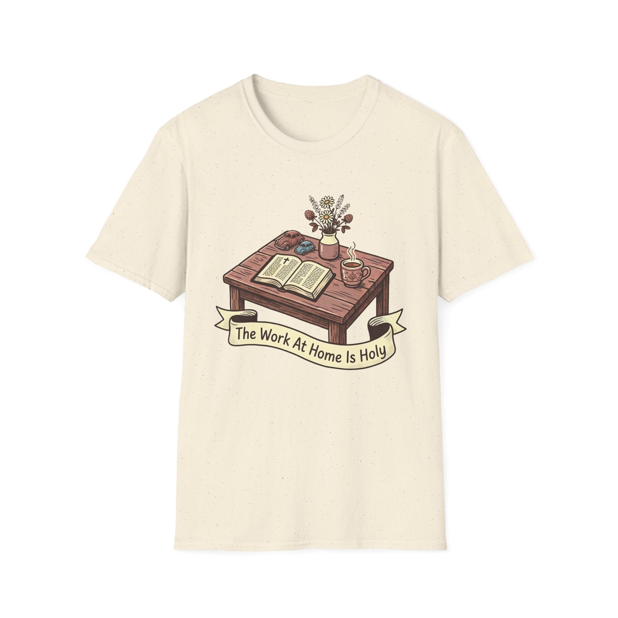 The Work At Home Is Holy homeschool mom graphic t-shirt with a gathered-at-home inspired graphic with books, florals, and cozy family learning details