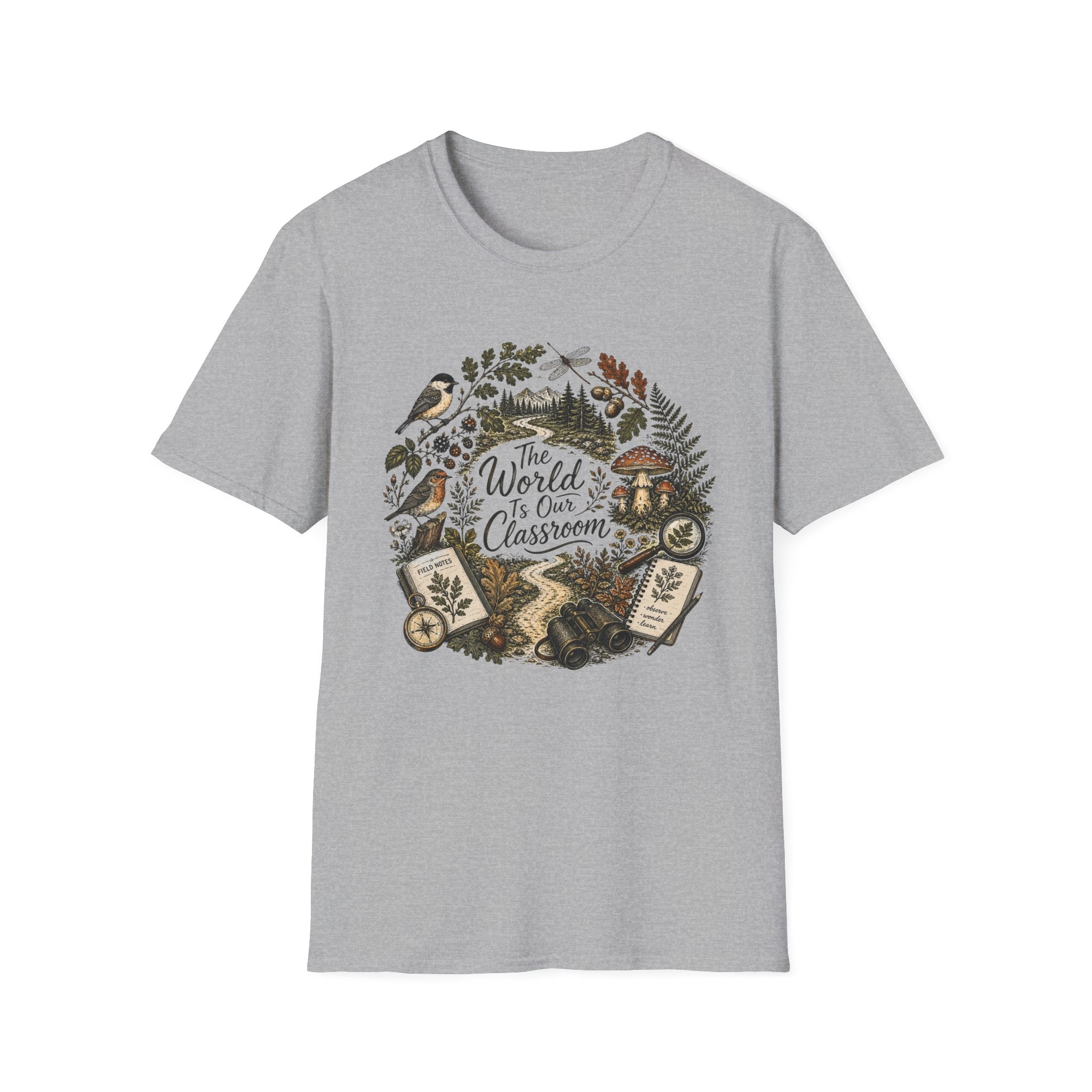 The World Is Our Classroom homeschool mom graphic t-shirt with an adventurous homeschool graphic with nature, books, and outdoor learning energy
