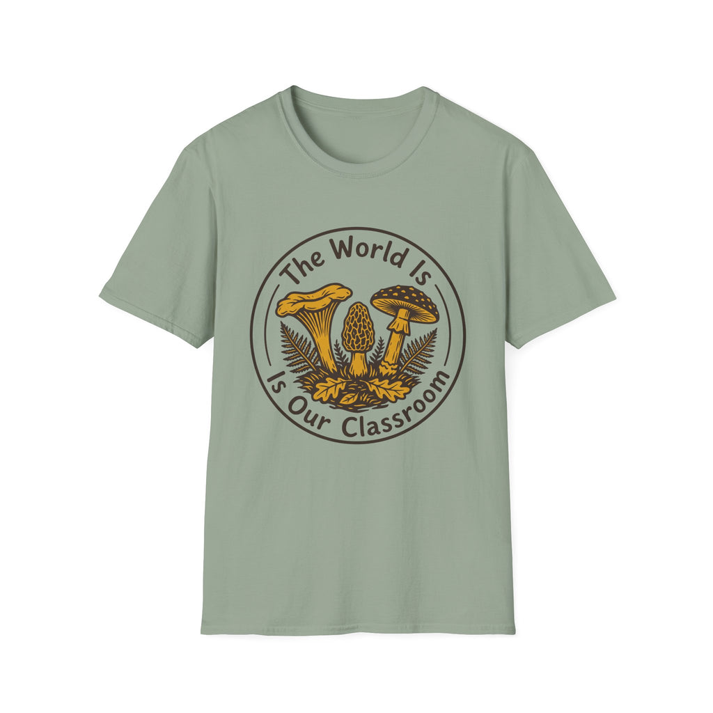 The World Is Our Classroom homeschool mom graphic t-shirt with an adventurous homeschool graphic with nature, books, and outdoor learning energy