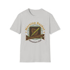 Morning Basket Adventure Club homeschool mom graphic t-shirt with a cozy morning basket-inspired design with books, gentle details, and home learning charm