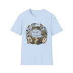 The World Is Our Classroom homeschool mom graphic t-shirt with an adventurous homeschool graphic with nature, books, and outdoor learning energy