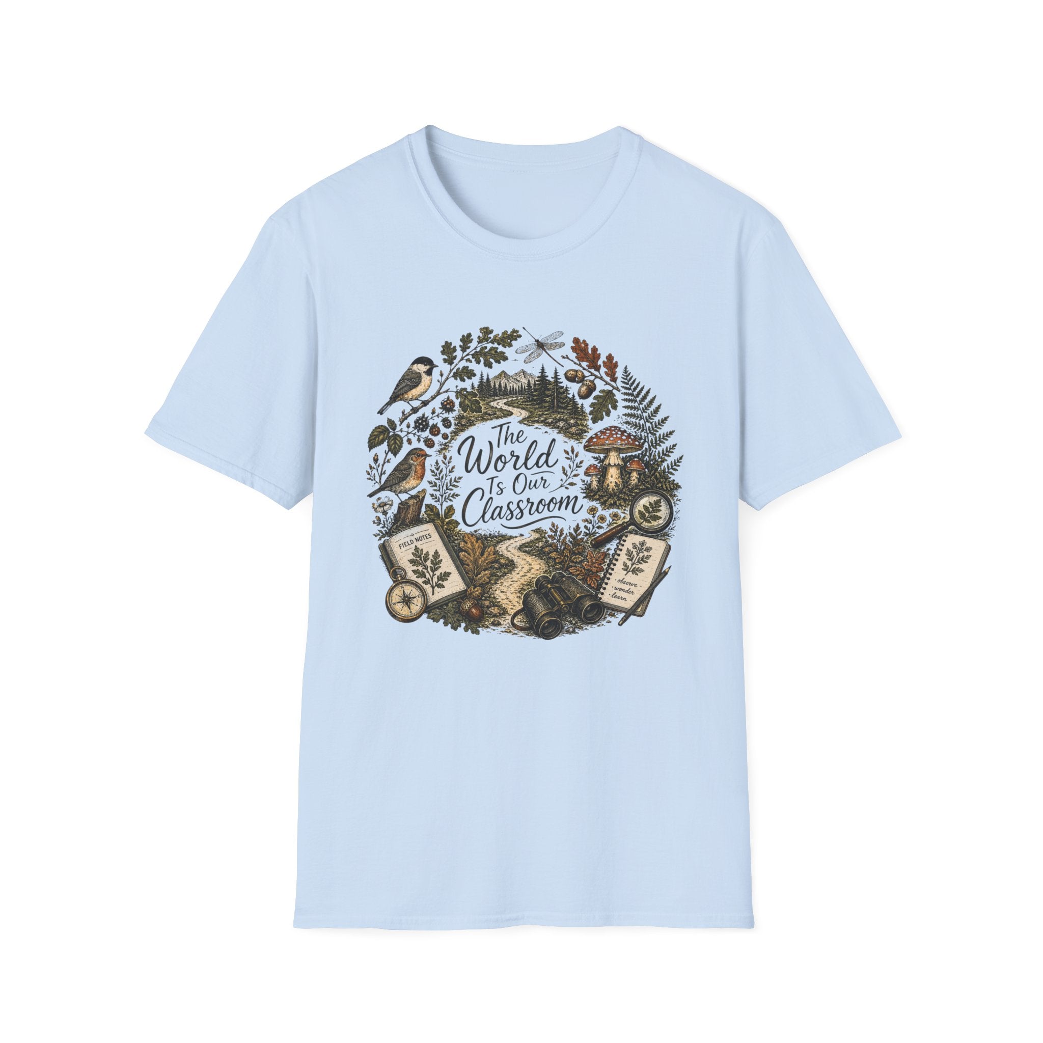 The World Is Our Classroom homeschool mom graphic t-shirt with an adventurous homeschool graphic with nature, books, and outdoor learning energy