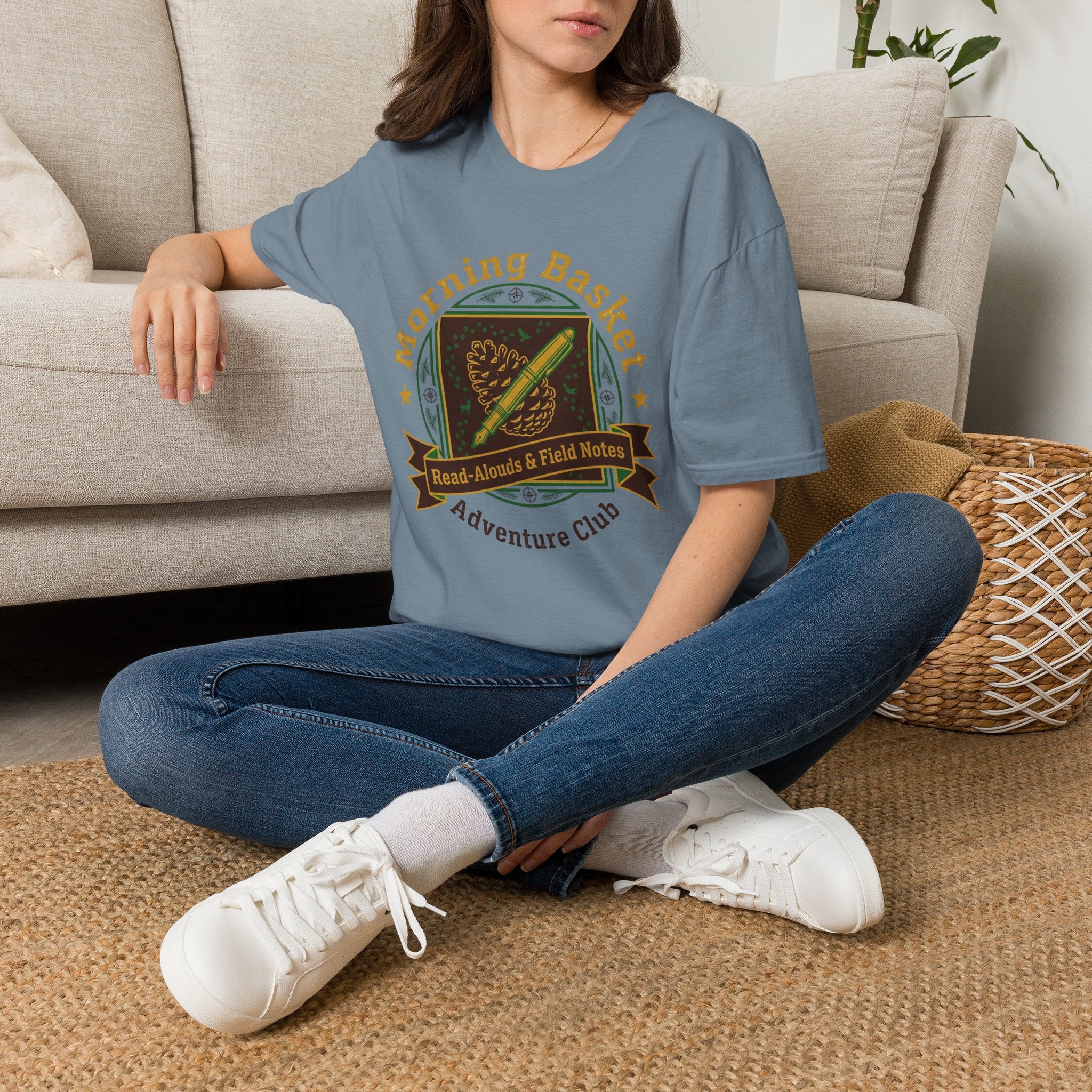 Morning Basket Adventure Club homeschool mom graphic t-shirt with a cozy morning basket-inspired design with books, gentle details, and home learning charm