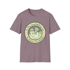In My Unschooling Era homeschool mom graphic t-shirt with an adventurous homeschool graphic with nature, books, and outdoor learning energy