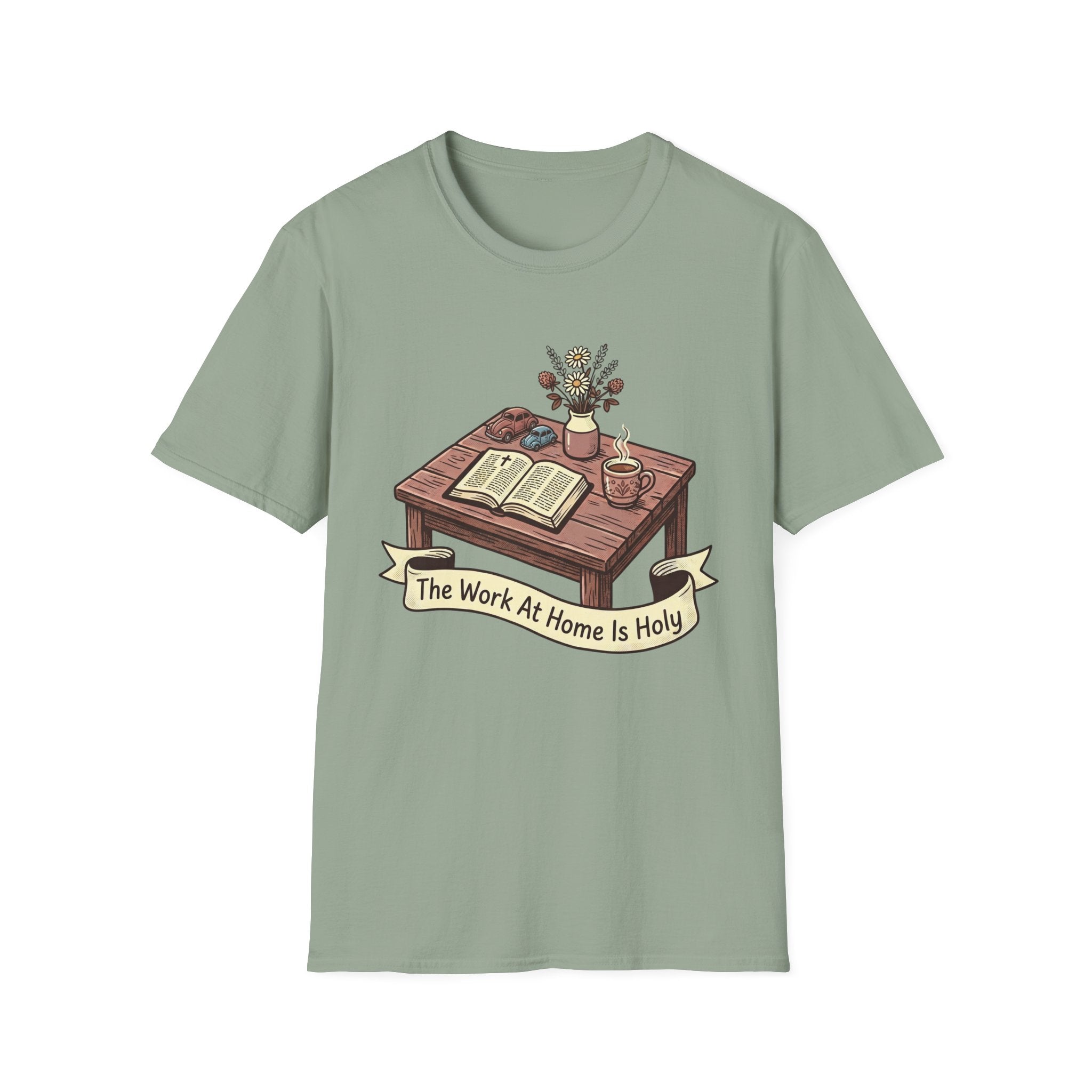 The Work At Home Is Holy homeschool mom graphic t-shirt with a gathered-at-home inspired graphic with books, florals, and cozy family learning details
