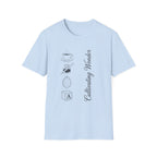 Cultivating Wonder homeschool mom graphic t-shirt with a Charlotte Mason-inspired design with books, nature details, and vintage homeschool charm