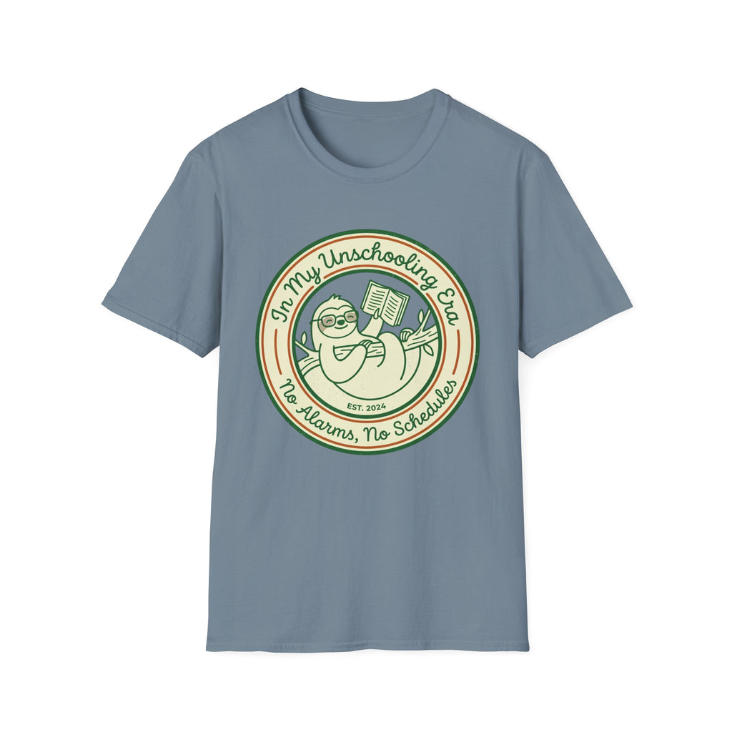 In My Unschooling Era homeschool mom graphic t-shirt with an adventurous homeschool graphic with nature, books, and outdoor learning energy