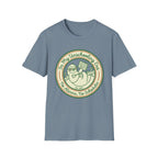 In My Unschooling Era homeschool mom graphic t-shirt with an adventurous homeschool graphic with nature, books, and outdoor learning energy