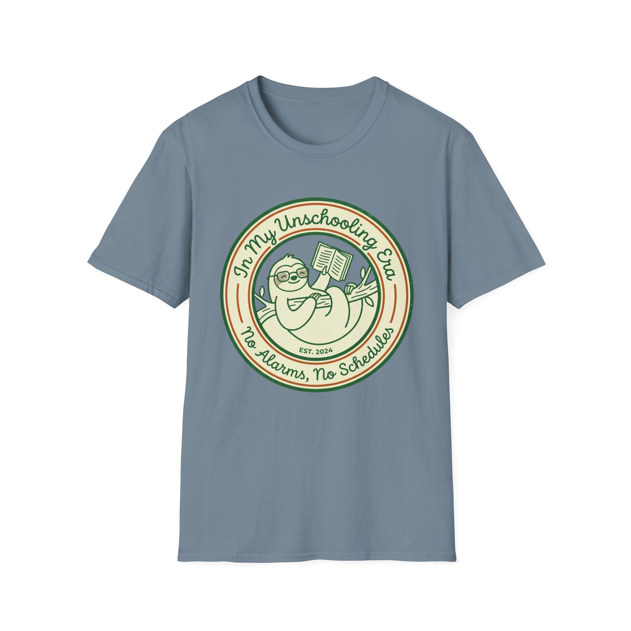 In My Unschooling Era homeschool mom graphic t-shirt with an adventurous homeschool graphic with nature, books, and outdoor learning energy