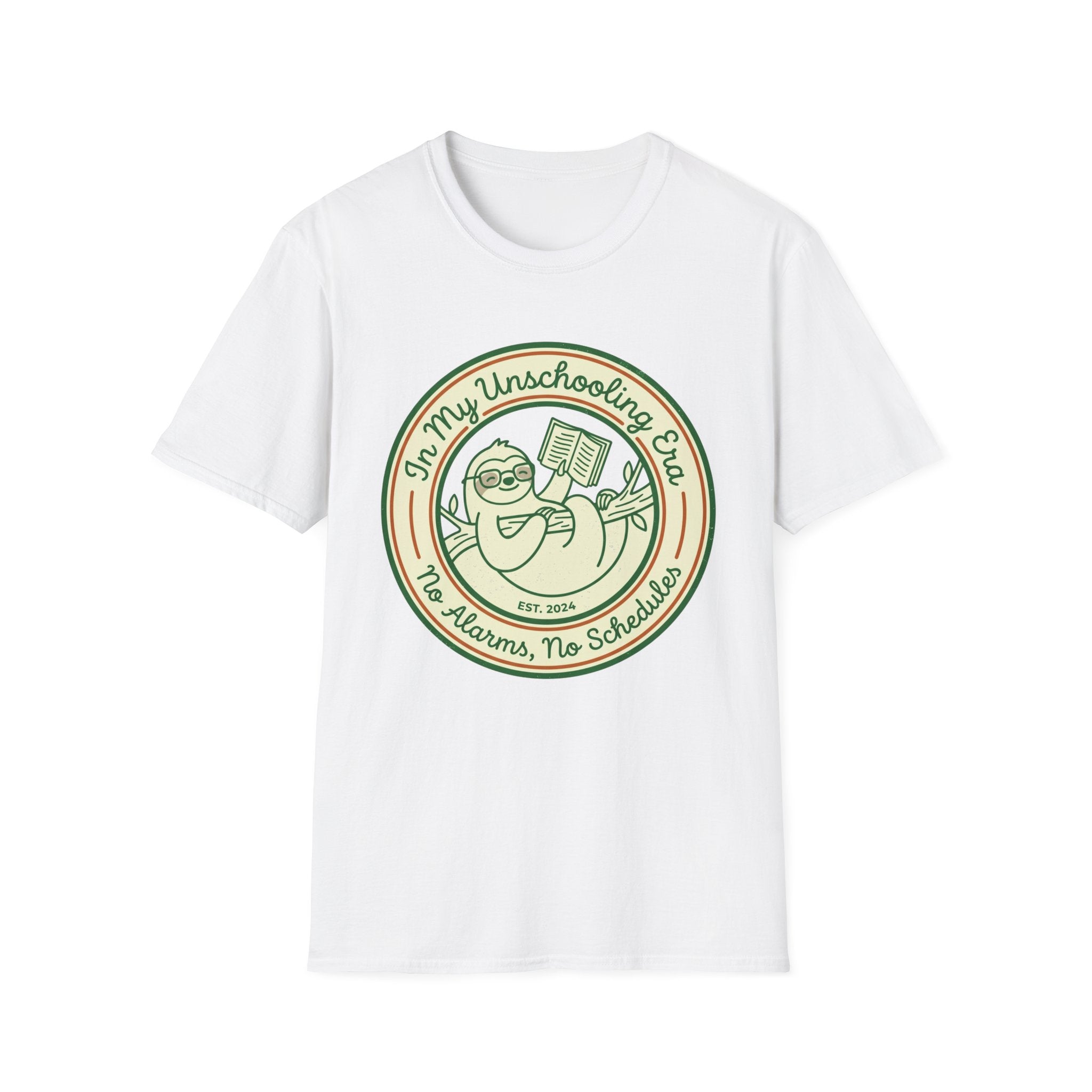 In My Unschooling Era homeschool mom graphic t-shirt with an adventurous homeschool graphic with nature, books, and outdoor learning energy