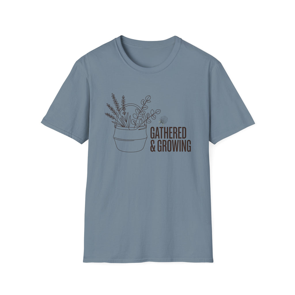 Gathered And Growing homeschool mom graphic t-shirt with a gathered-at-home inspired graphic with books, florals, and cozy family learning details
