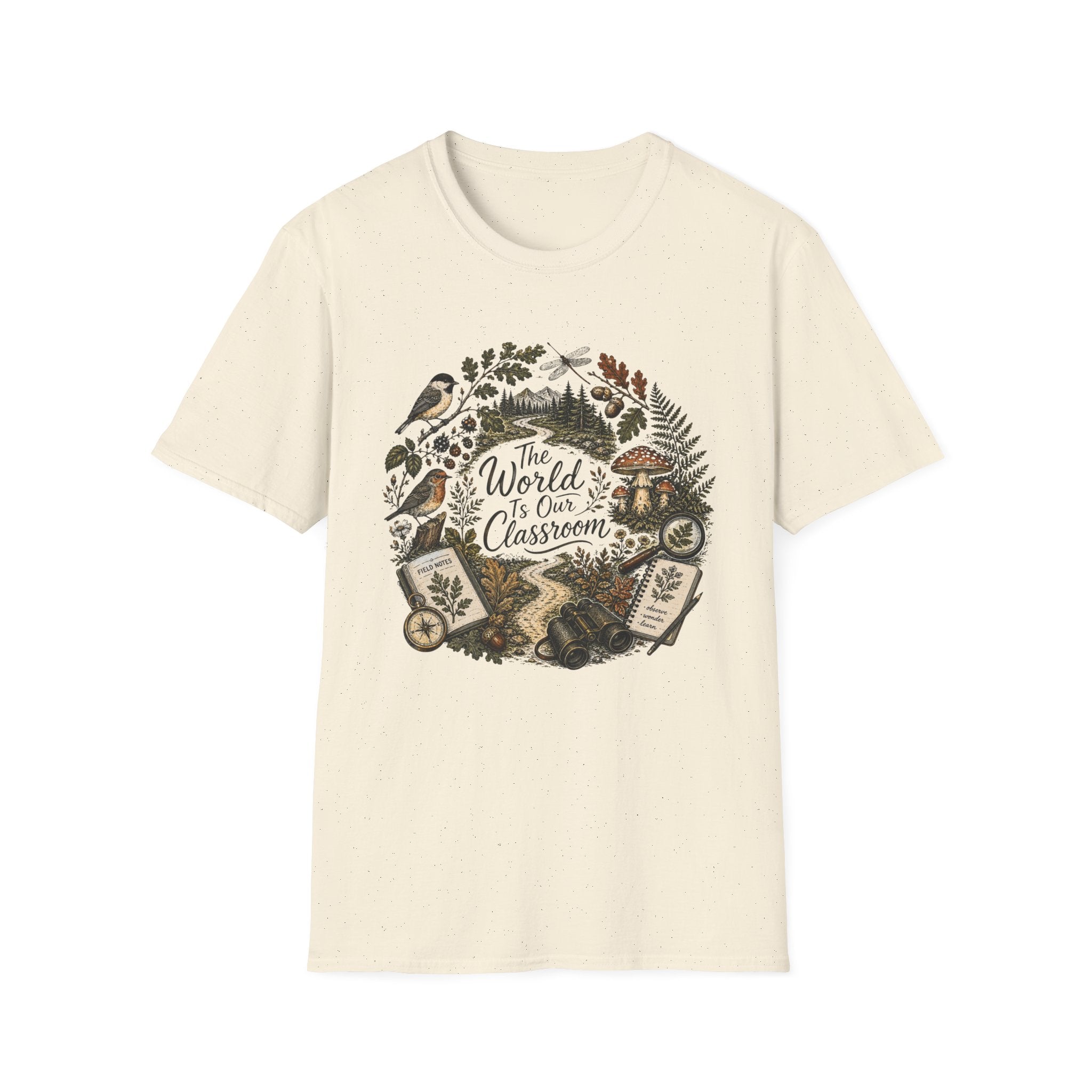 The World Is Our Classroom homeschool mom graphic t-shirt with an adventurous homeschool graphic with nature, books, and outdoor learning energy