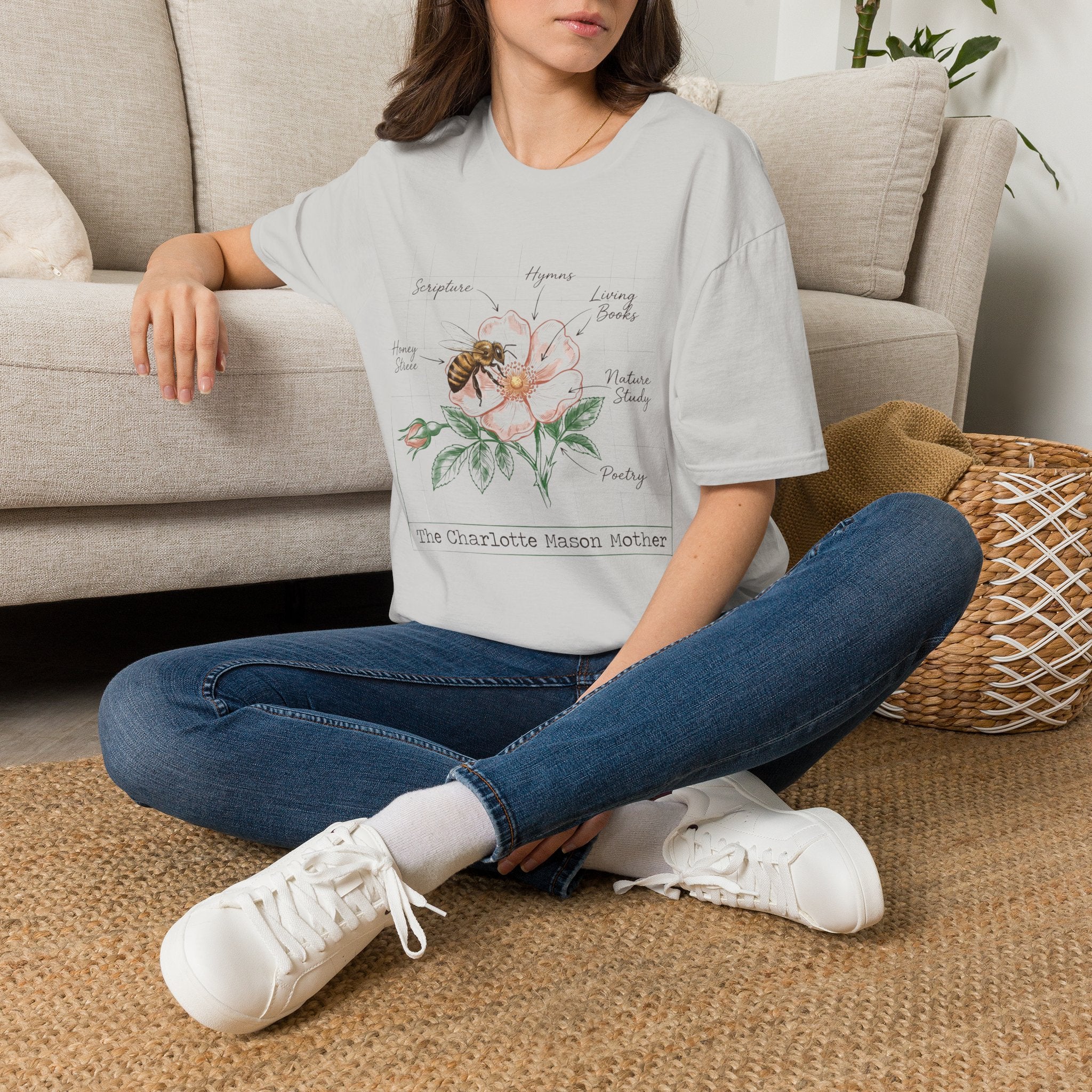 Mason Mother homeschool mom graphic t-shirt with a Charlotte Mason-inspired design with books, nature details, and vintage homeschool charm