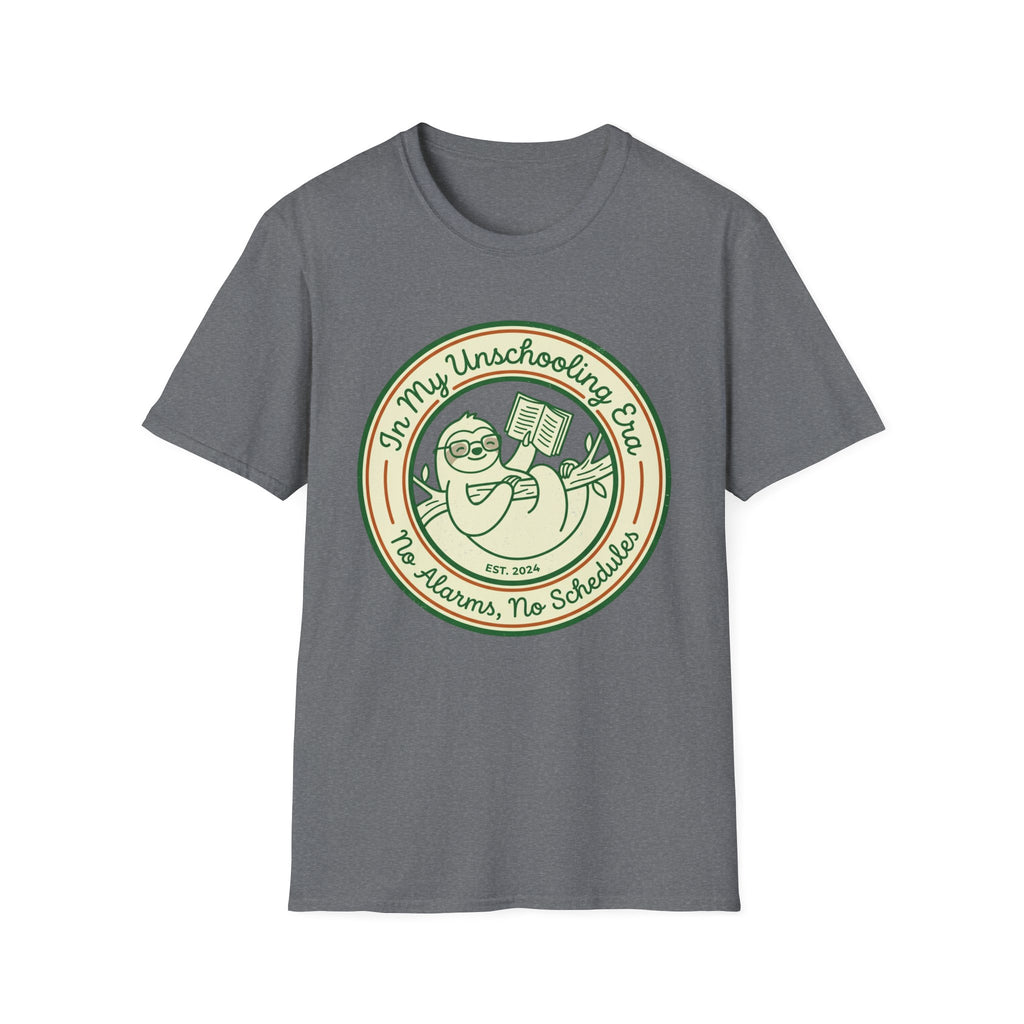 In My Unschooling Era homeschool mom graphic t-shirt with an adventurous homeschool graphic with nature, books, and outdoor learning energy
