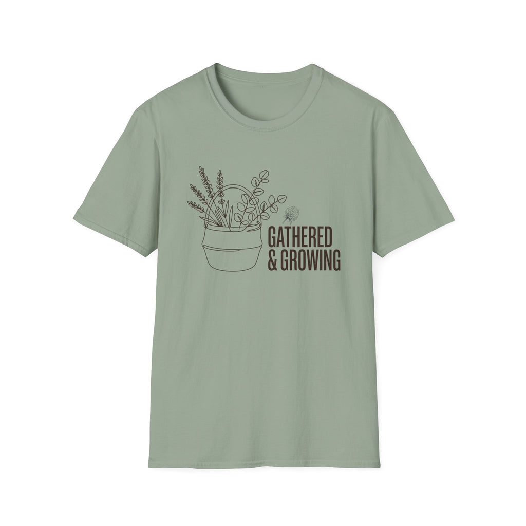 Gathered And Growing homeschool mom graphic t-shirt with a gathered-at-home inspired graphic with books, florals, and cozy family learning details
