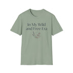 My Wild and Free Era homeschool mom graphic t-shirt with an adventurous homeschool graphic with nature, books, and outdoor learning energy