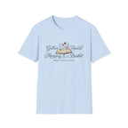 Gather Round The Morning Basket homeschool mom graphic t-shirt with a gathered-at-home inspired graphic with books, florals, and cozy family learning details