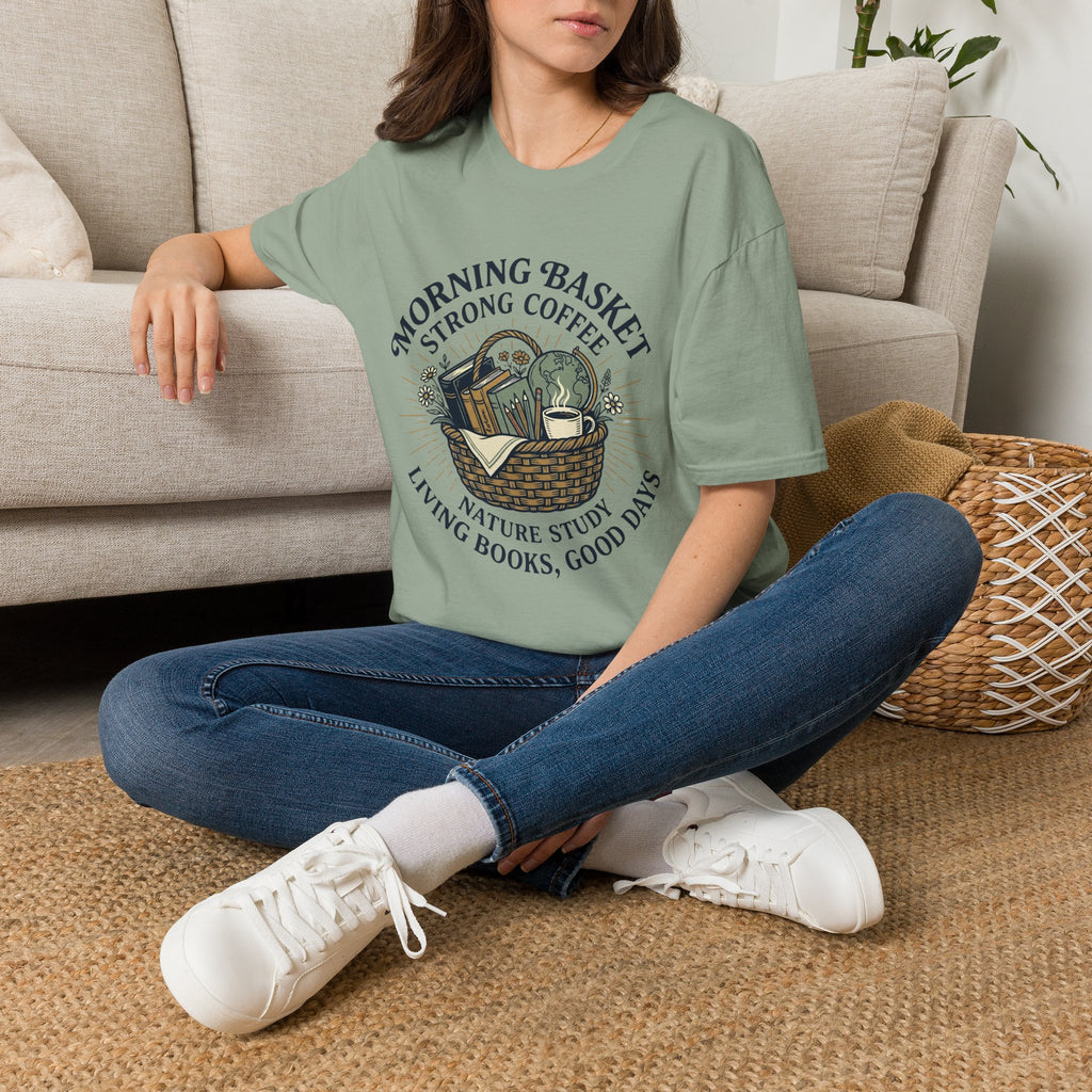 Morning Basket Strong Coffee homeschool mom graphic t-shirt with a cozy morning basket-inspired design with books, gentle details, and home learning charm