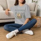 This Is Our Morning homeschool mom graphic t-shirt with a gathered-at-home inspired graphic with books, florals, and cozy family learning details