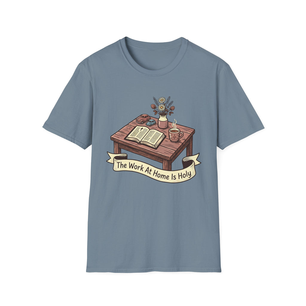 The Work At Home Is Holy homeschool mom graphic t-shirt with a gathered-at-home inspired graphic with books, florals, and cozy family learning details