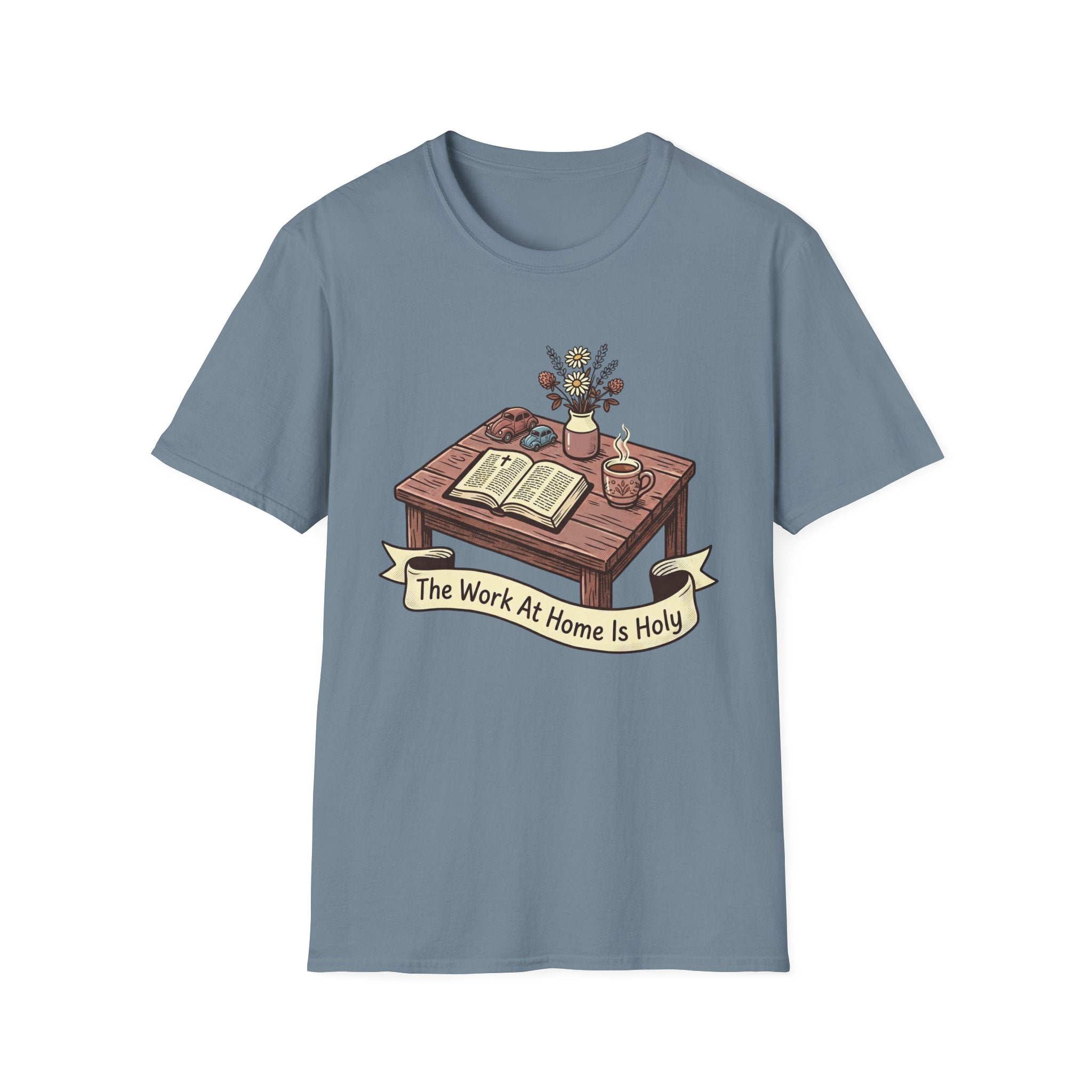 The Work At Home Is Holy homeschool mom graphic t-shirt with a gathered-at-home inspired graphic with books, florals, and cozy family learning details