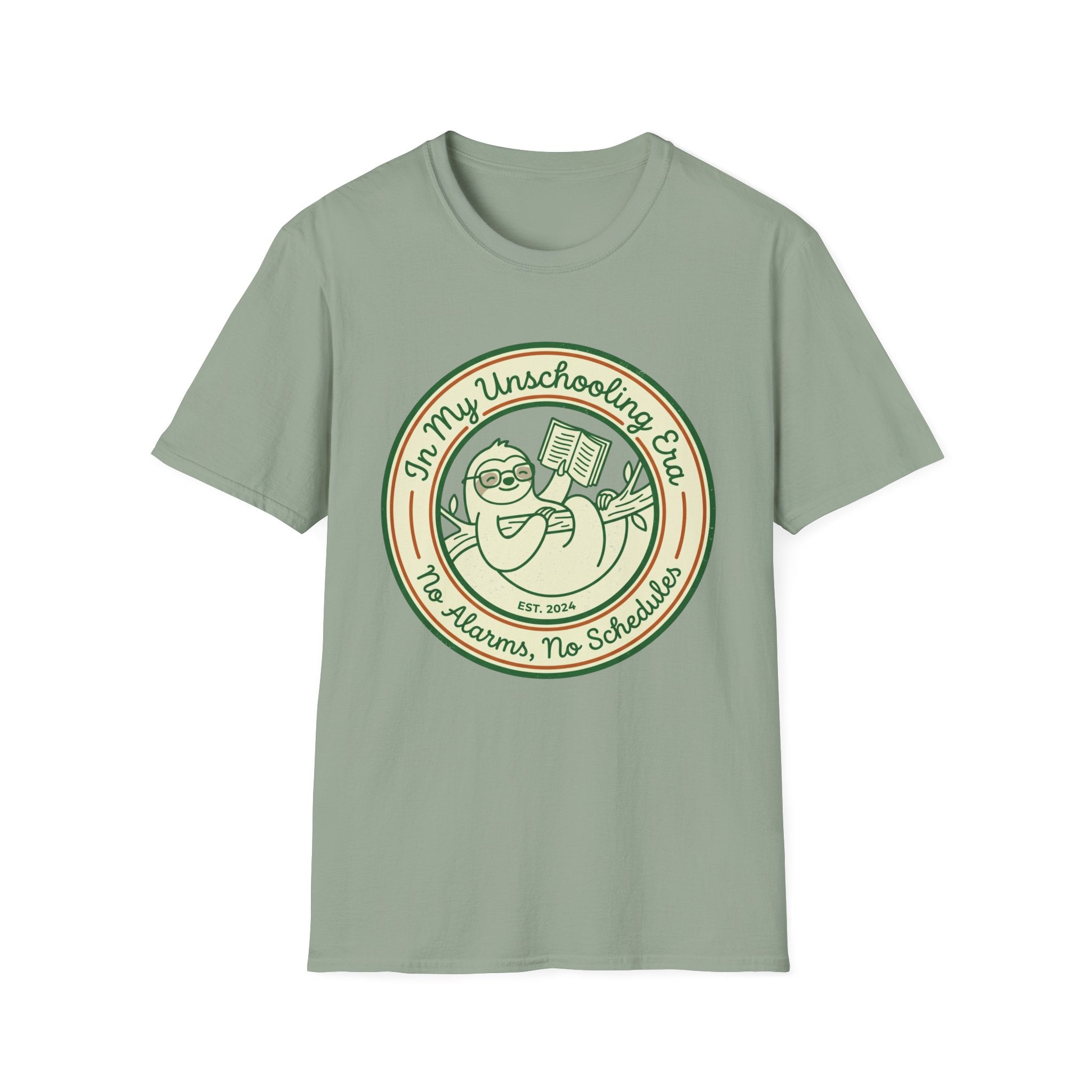 In My Unschooling Era homeschool mom graphic t-shirt with an adventurous homeschool graphic with nature, books, and outdoor learning energy