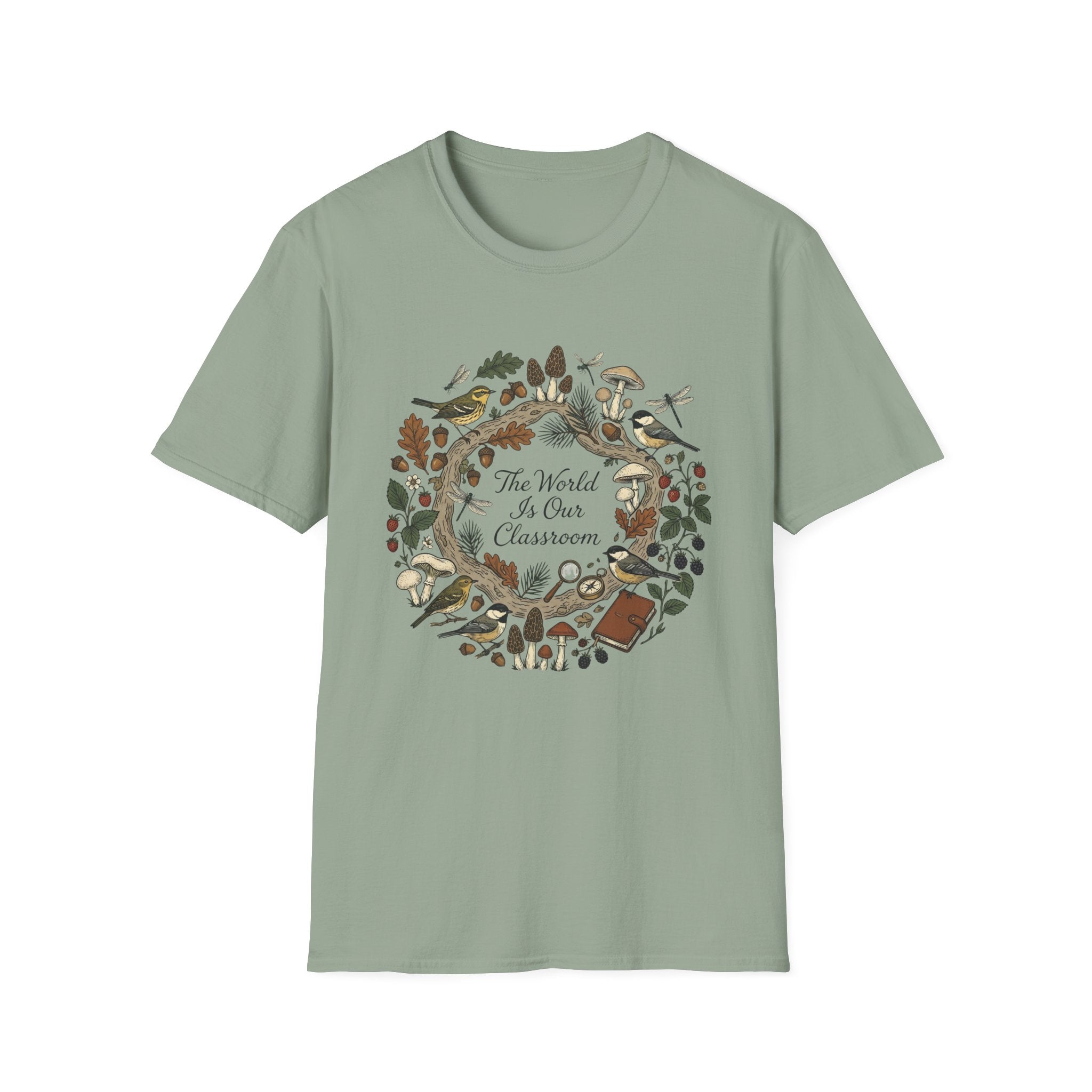 The World Is Our Classroom homeschool mom graphic t-shirt with an adventurous homeschool graphic with nature, books, and outdoor learning energy