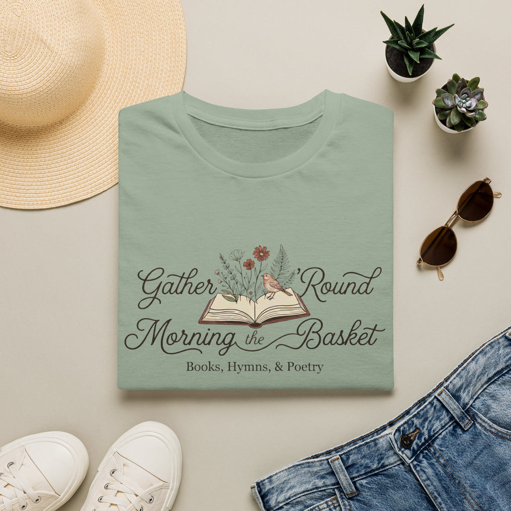 Gather Round The Morning Basket homeschool mom graphic t-shirt with a gathered-at-home inspired graphic with books, florals, and cozy family learning details