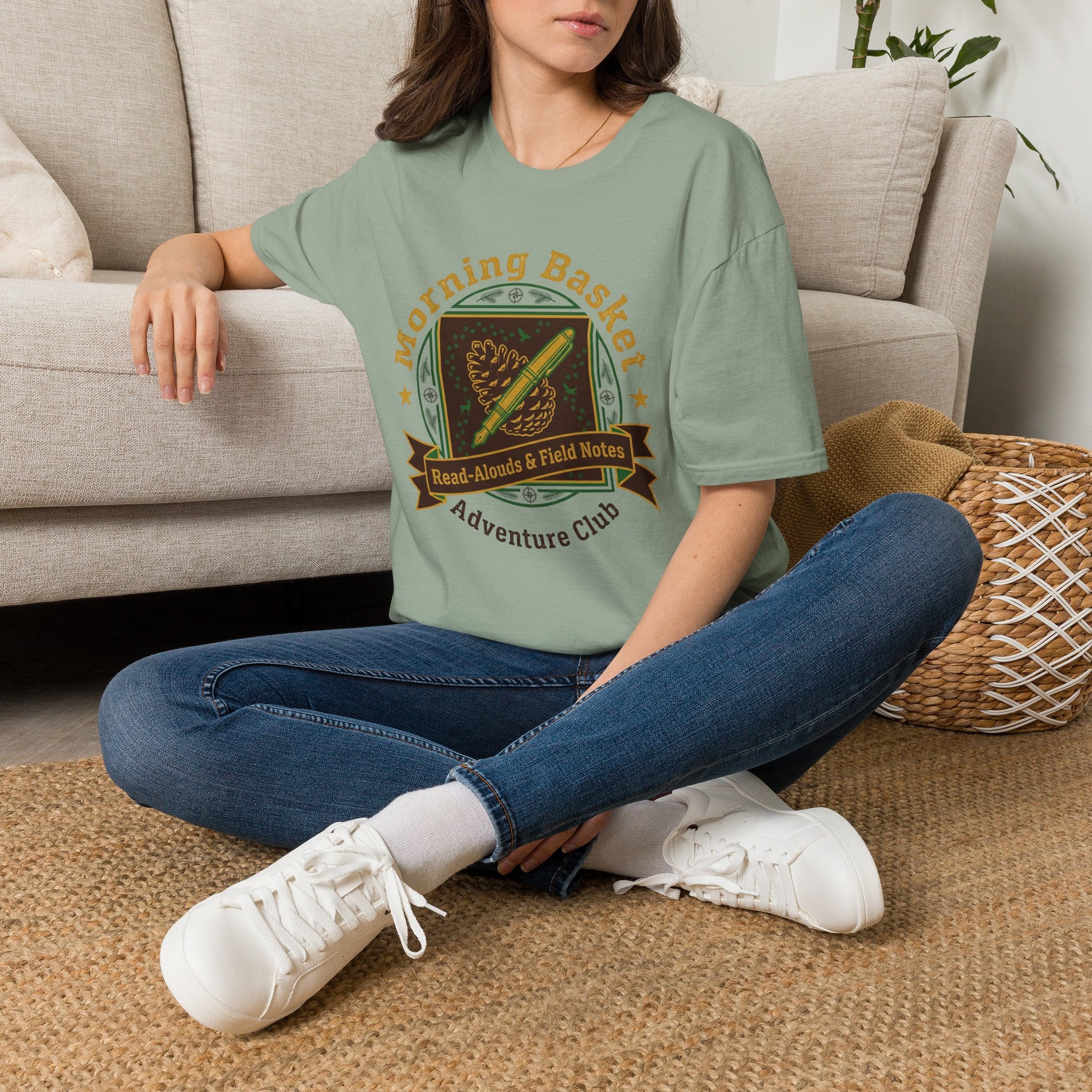 Morning Basket Adventure Club homeschool mom graphic t-shirt with a cozy morning basket-inspired design with books, gentle details, and home learning charm
