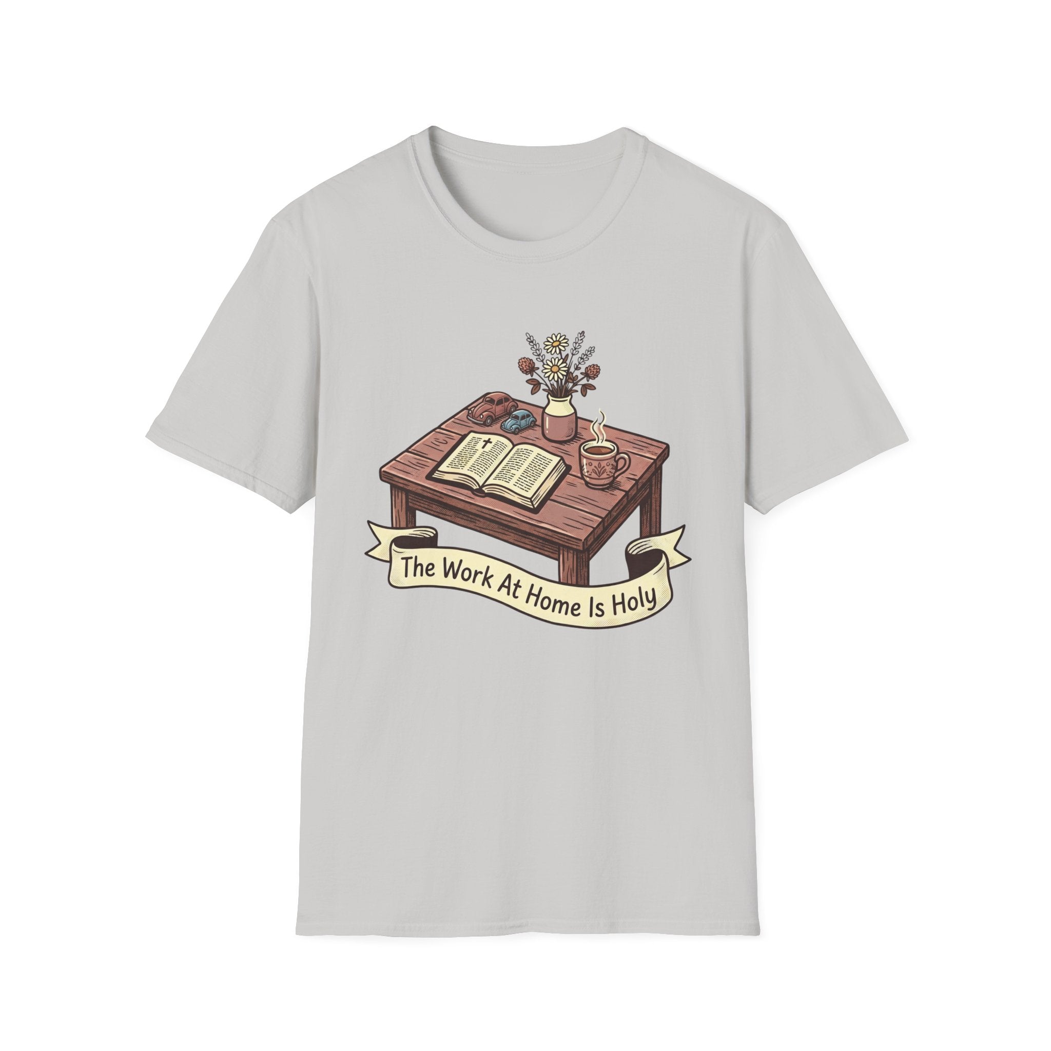 The Work At Home Is Holy homeschool mom graphic t-shirt with a gathered-at-home inspired graphic with books, florals, and cozy family learning details