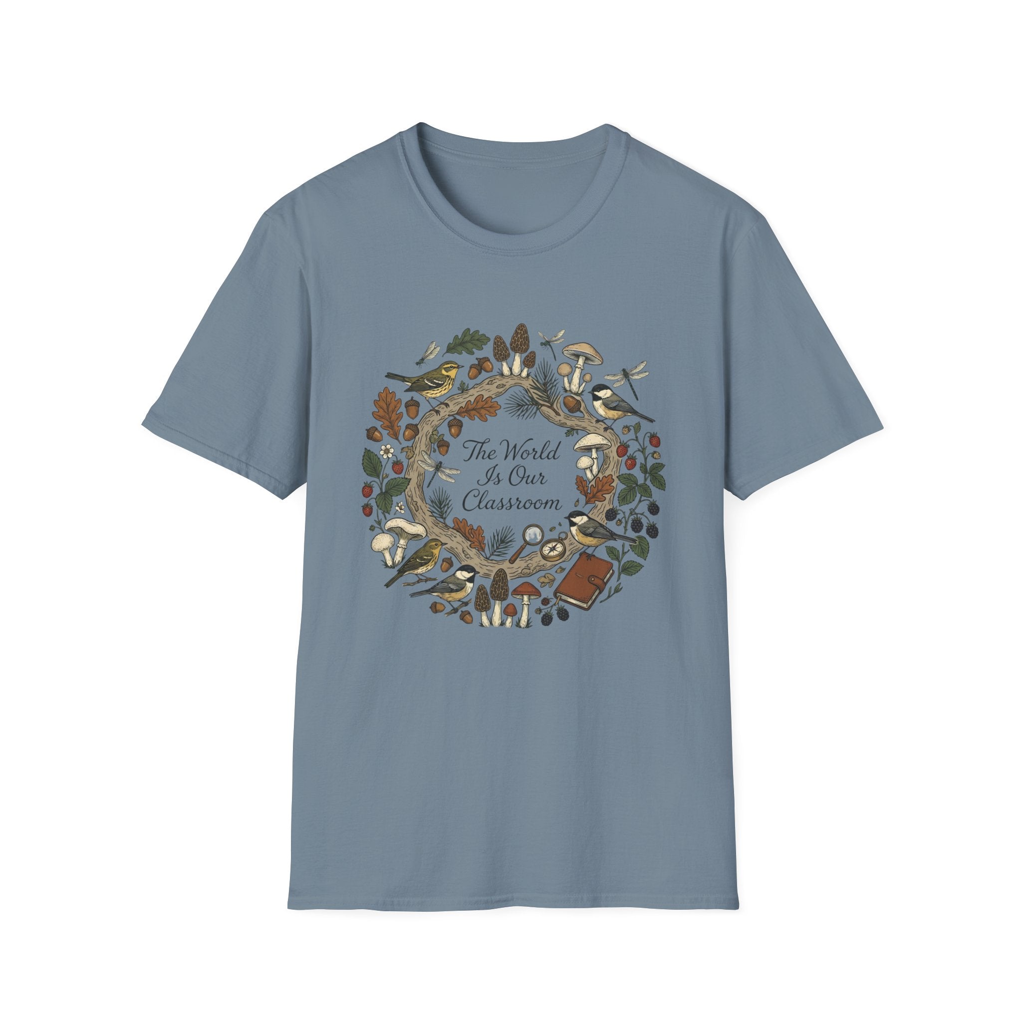 The World Is Our Classroom homeschool mom graphic t-shirt with an adventurous homeschool graphic with nature, books, and outdoor learning energy