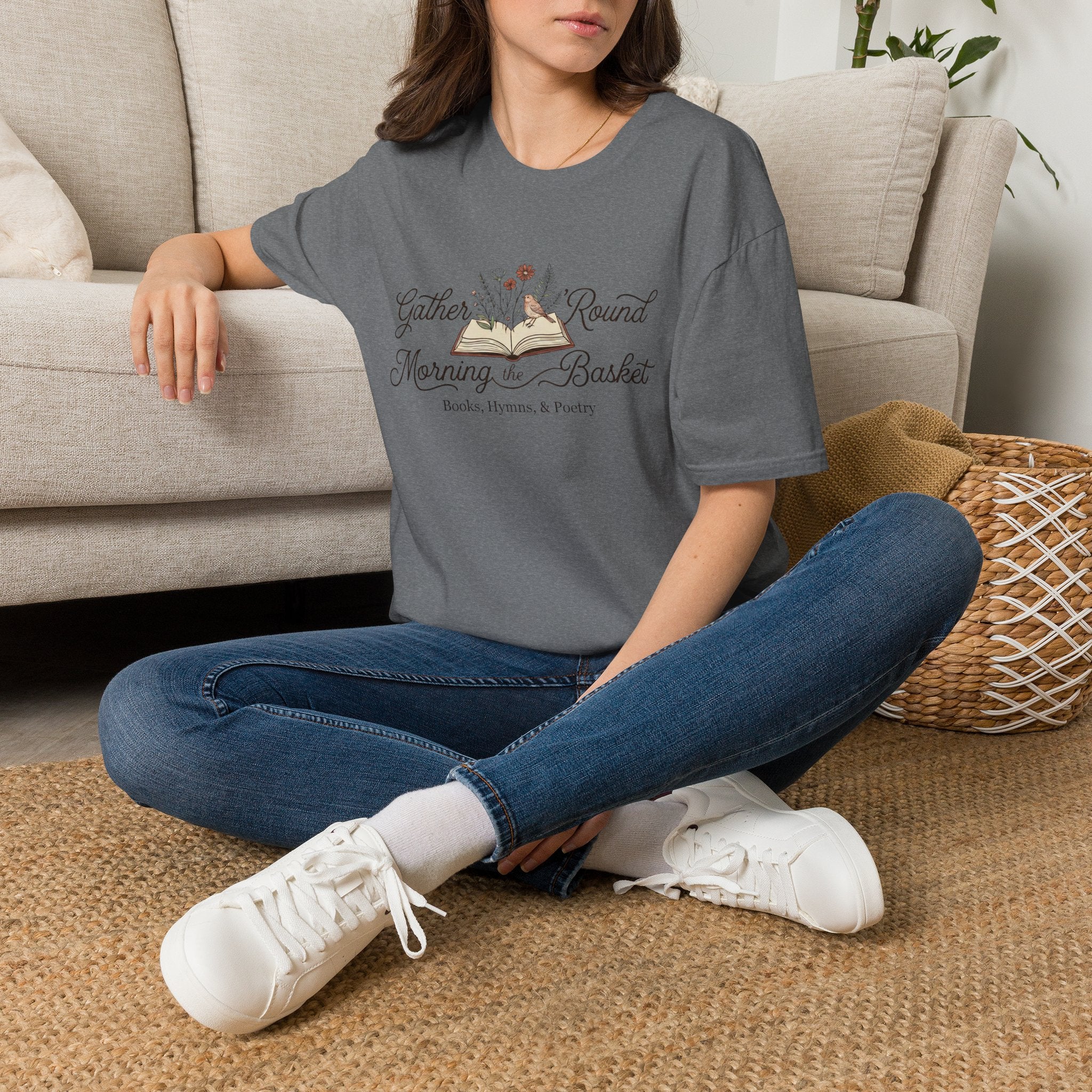 Gather Round The Morning Basket homeschool mom graphic t-shirt with a gathered-at-home inspired graphic with books, florals, and cozy family learning details