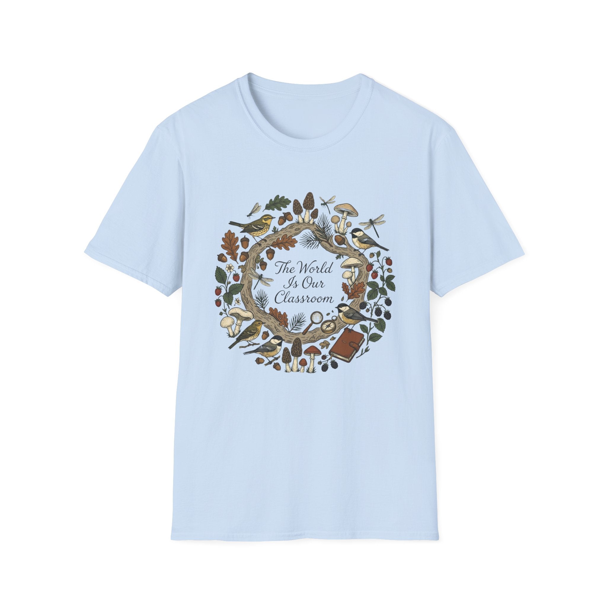 The World Is Our Classroom homeschool mom graphic t-shirt with an adventurous homeschool graphic with nature, books, and outdoor learning energy