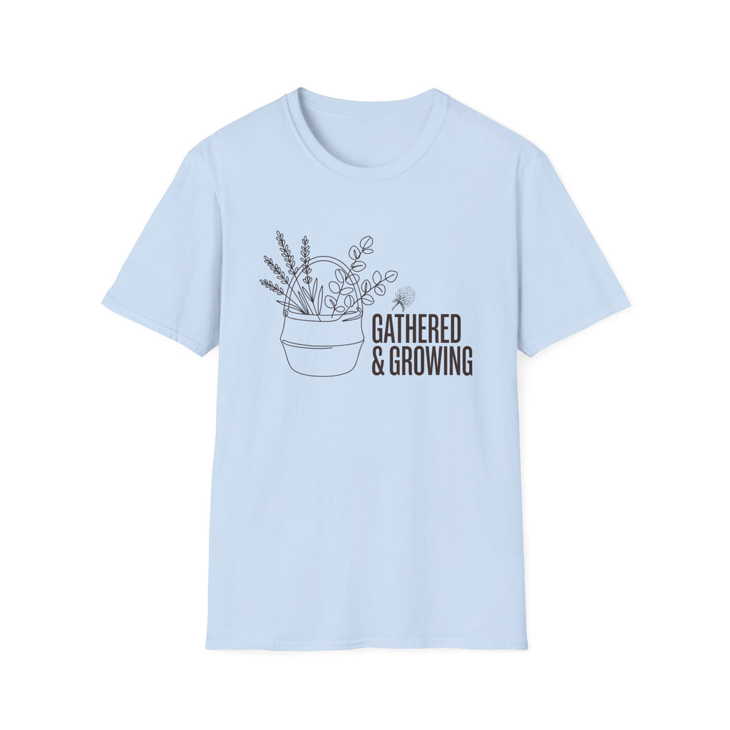 Gathered And Growing homeschool mom graphic t-shirt with a gathered-at-home inspired graphic with books, florals, and cozy family learning details