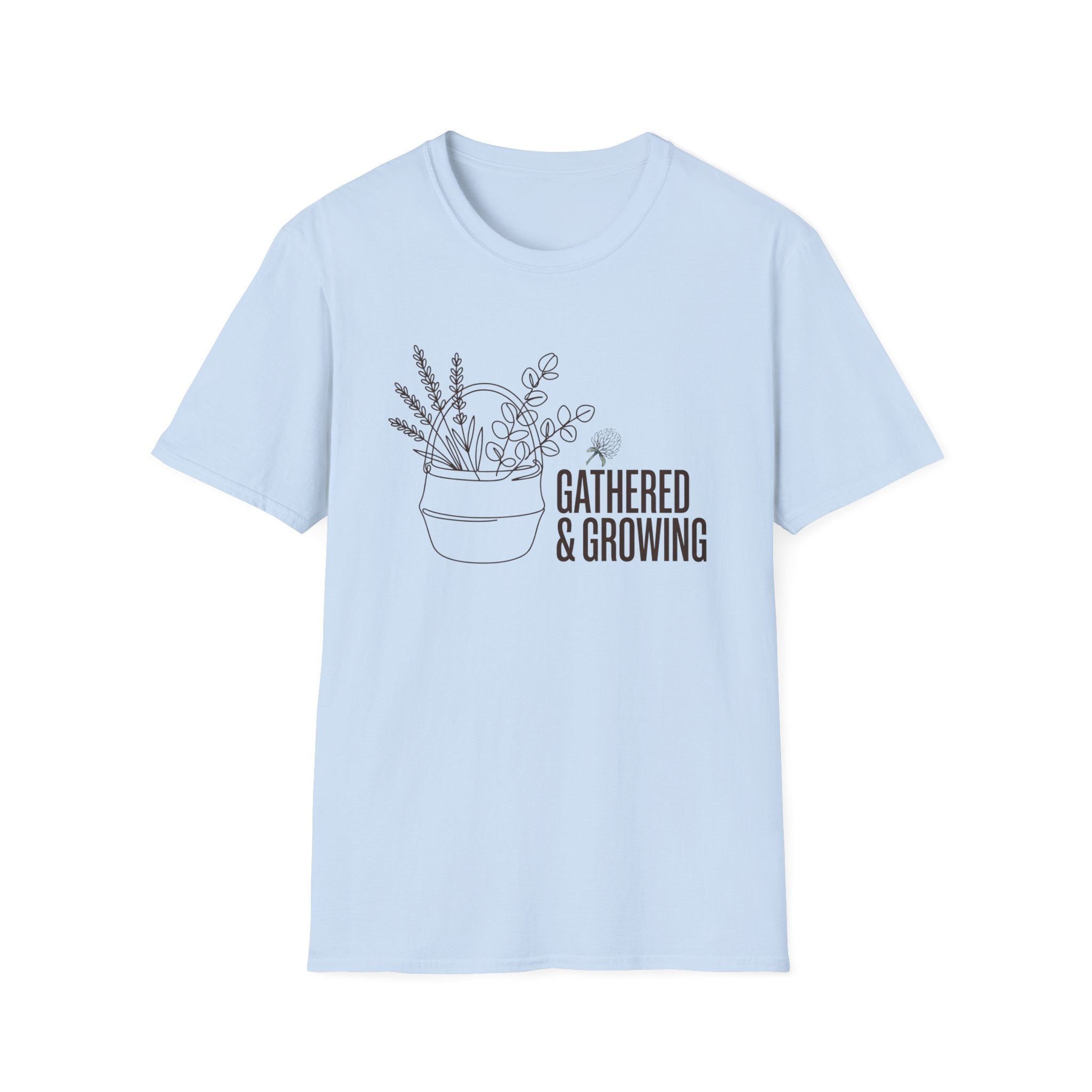 Gathered And Growing homeschool mom graphic t-shirt with a gathered-at-home inspired graphic with books, florals, and cozy family learning details