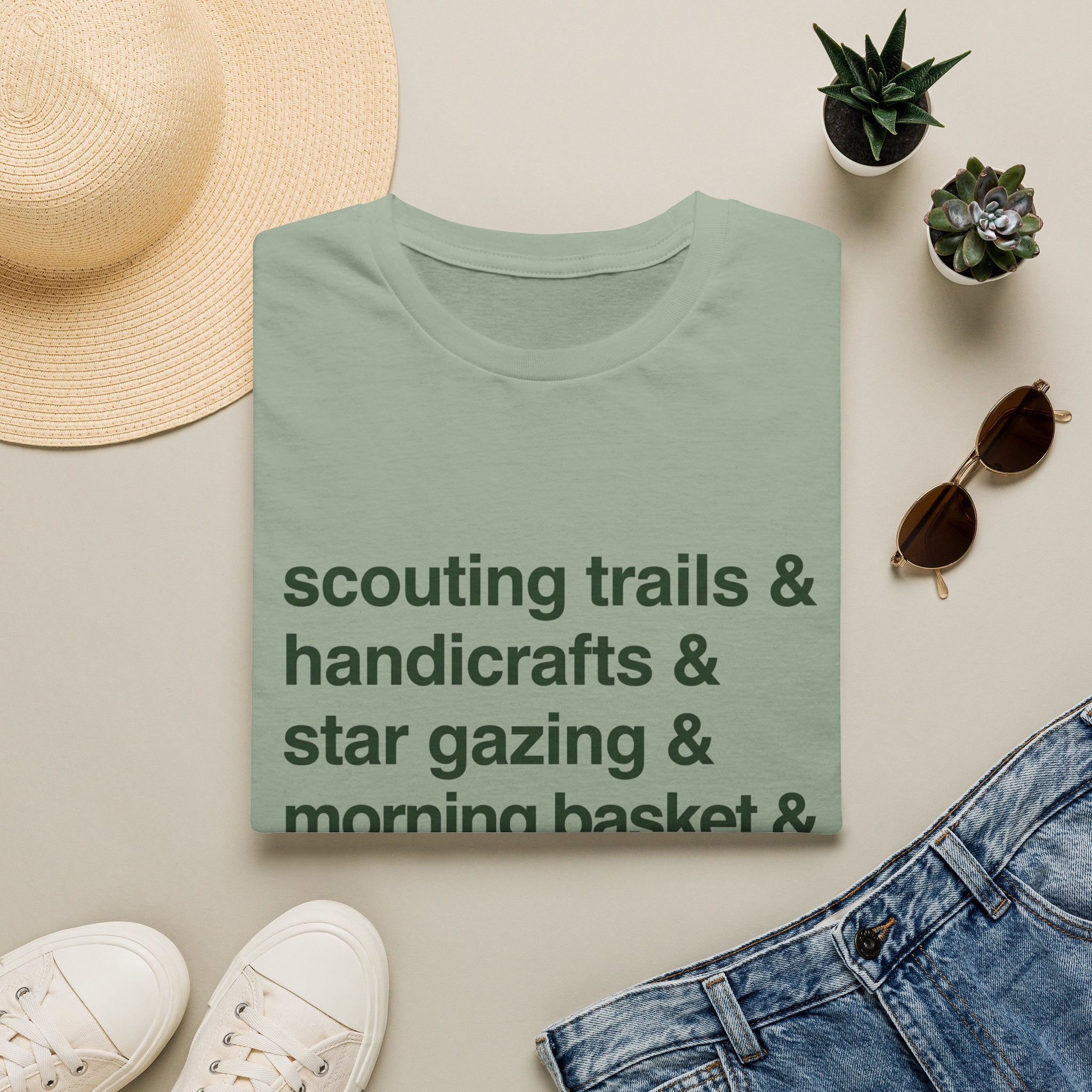 Scouting Trails Check List homeschool mom graphic t-shirt with a playful checklist-style homeschool graphic with bookish and nature-inspired details
