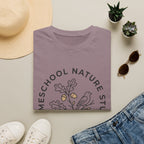Homeschool Nature Study homeschool mom graphic t-shirt with a Charlotte Mason-inspired design with nature details, bookish elements, and classic homeschool lettering