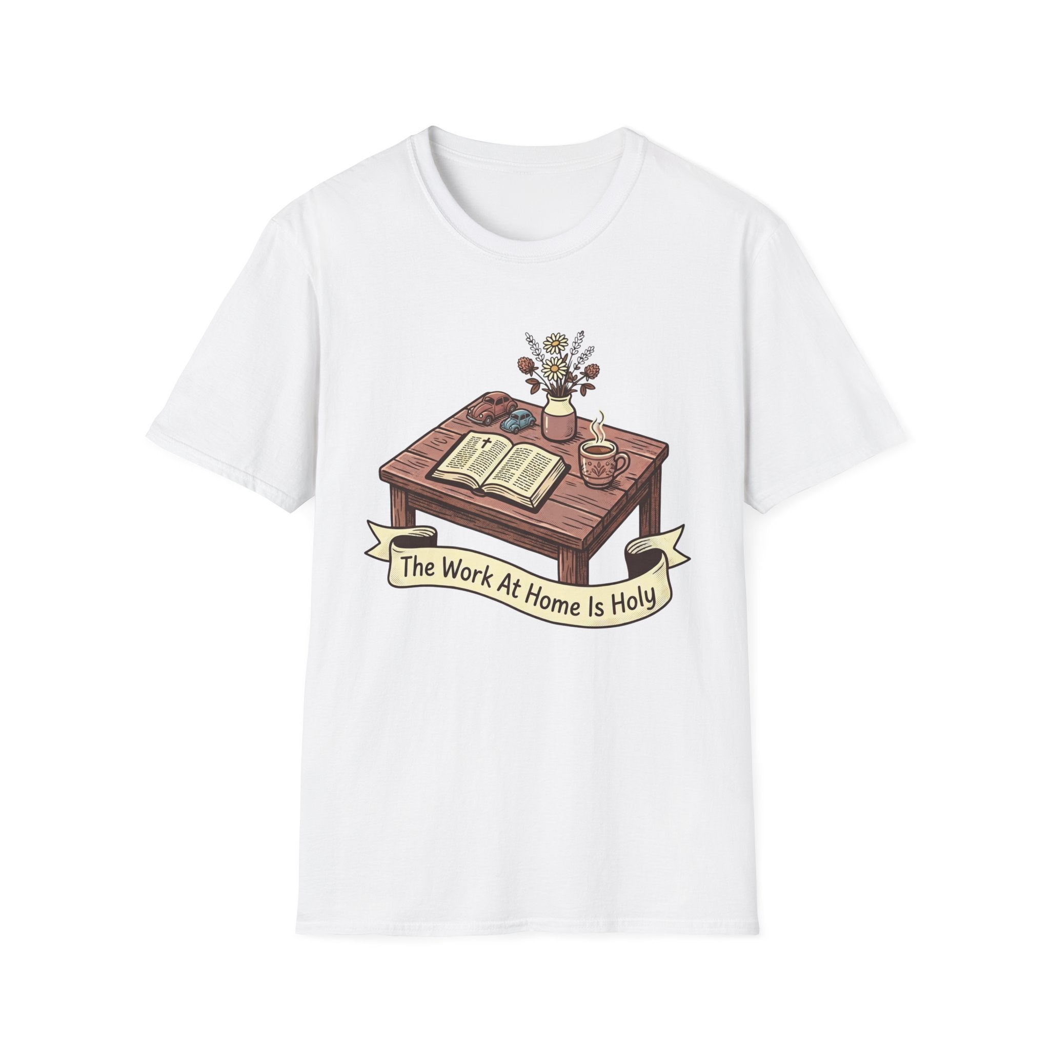 The Work At Home Is Holy homeschool mom graphic t-shirt with a gathered-at-home inspired graphic with books, florals, and cozy family learning details