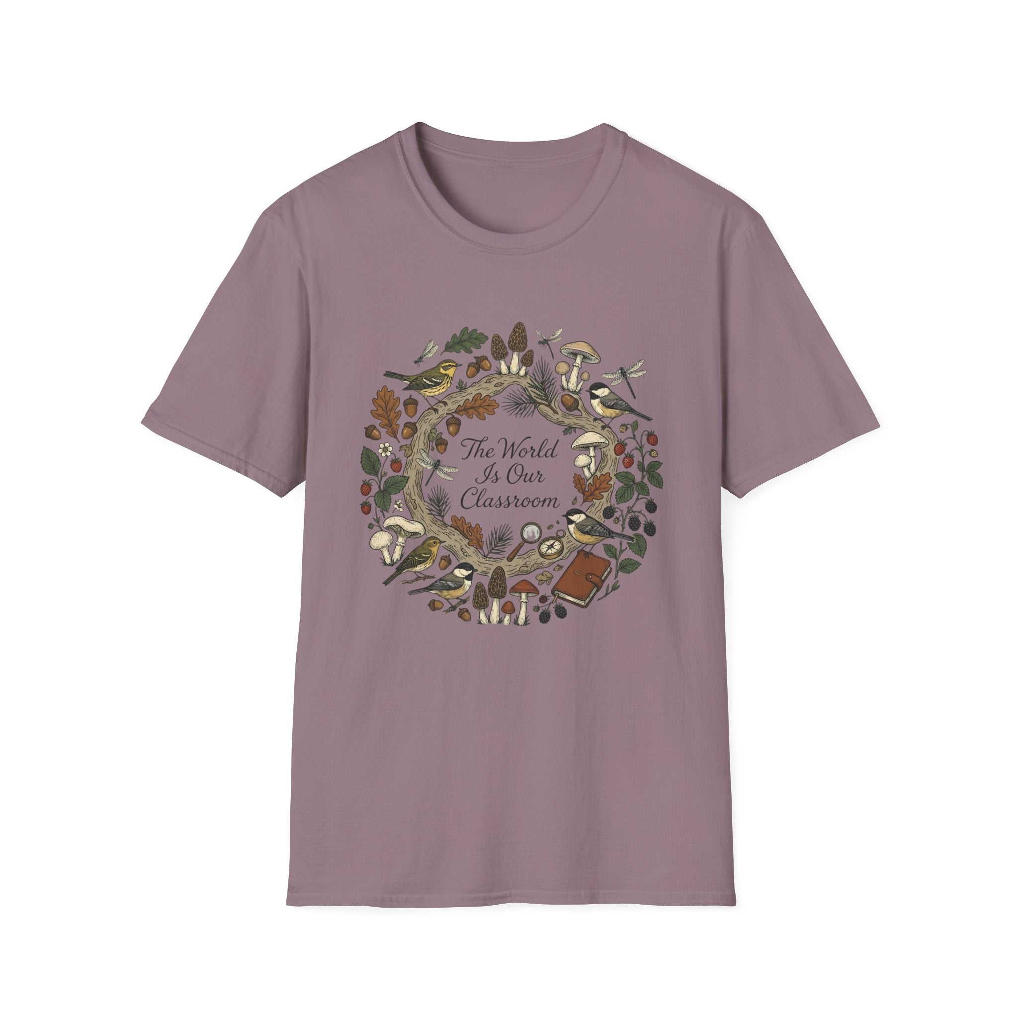 The World Is Our Classroom homeschool mom graphic t-shirt with an adventurous homeschool graphic with nature, books, and outdoor learning energy