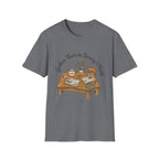 Gather Them In Beauty homeschool mom graphic t-shirt with a gathered-at-home inspired graphic with books, florals, and cozy family learning details