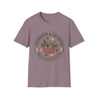 Gathered & Growing homeschool mom graphic t-shirt with a gathered-at-home inspired graphic with books, florals, and cozy family learning details
