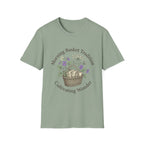 Morning Basket Tradition homeschool mom graphic t-shirt with a cozy morning basket-inspired design with books, gentle details, and home learning charm