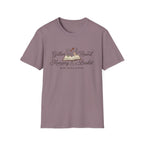 Gather Round The Morning Basket homeschool mom graphic t-shirt with a gathered-at-home inspired graphic with books, florals, and cozy family learning details