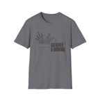 Gathered And Growing homeschool mom graphic t-shirt with a gathered-at-home inspired graphic with books, florals, and cozy family learning details