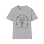 The Work At Home homeschool mom graphic t-shirt with a gathered-at-home inspired graphic with books, florals, and cozy family learning details