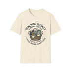 Morning Basket Strong Coffee homeschool mom graphic t-shirt with a cozy morning basket-inspired design with books, gentle details, and home learning charm
