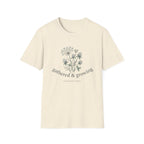 Gathered & Growing homeschool mom graphic t-shirt with a gathered-at-home inspired graphic with books, florals, and cozy family learning details